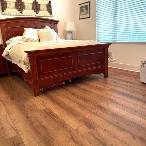 Bedroom with medium textured LVP Flooring